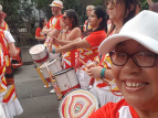 Wellington Batucada drummers and dancers parade at CubaDupa. Photo by Kelly Etuata.