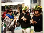 2015 Hastings Blossom Festival - Lisa L, Paquita, Charlene (eating sossies-and-bread) - photo by Alison Green