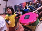 Small fan, big drum at the Soccer World Cup - photo by John Zhu