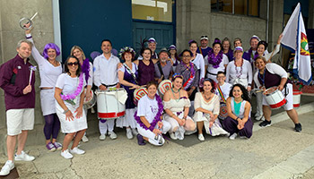 Team photo in purple at Relay for Life 2021 - photo by Rebecca Routhan